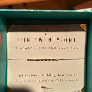 21 milestone bracelet, never worn!